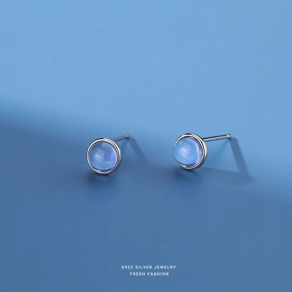 

Женские серьги-гвоздики из серебра 100% пробы с лунным камнем