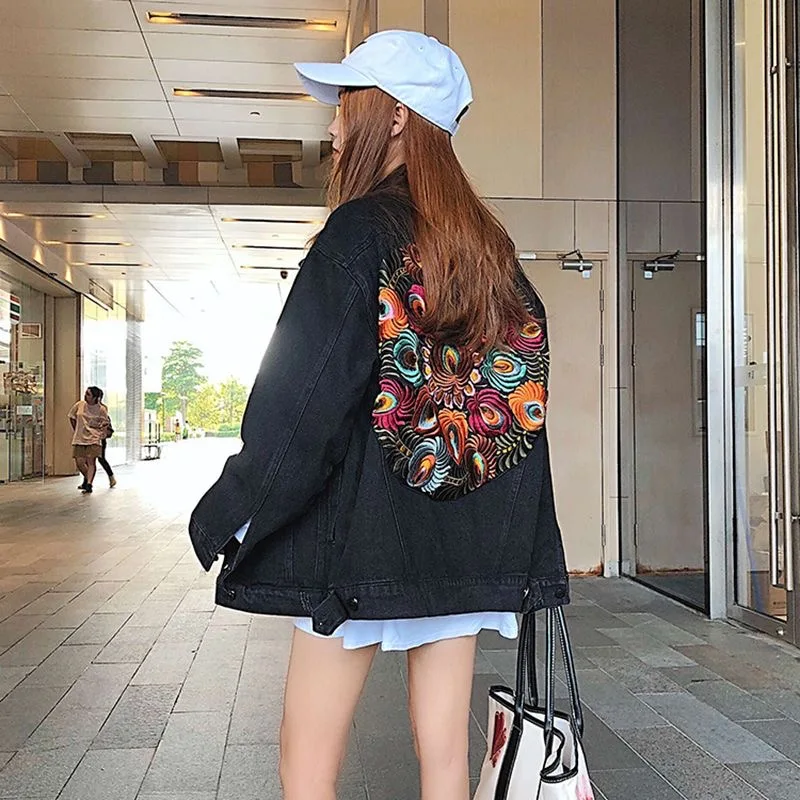 Женская джинсовая куртка большого