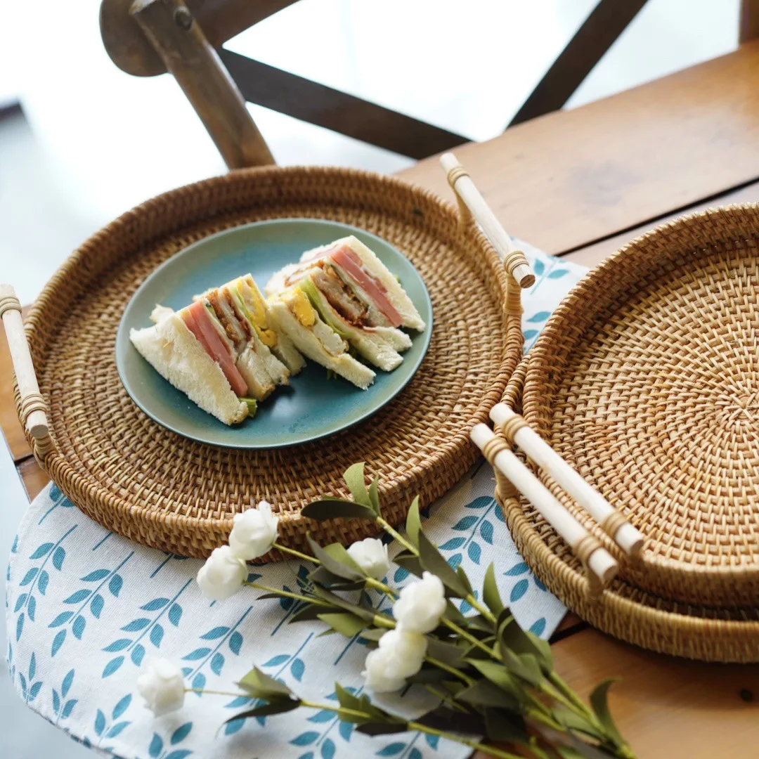 

Handwoven Rattan Storage Tray With Wooden Handle Round Wicker Basket Bread Food Plate Fruit Cake Platter Dinner Serving Tray