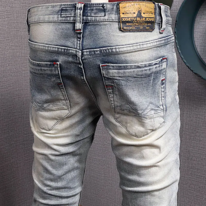 Fashion Designer Men Jeans Retro Light Blue Elastic Slim Fit Ripped Jeans Men Vintage Trousers Patched Casual Denim Pants Hombre