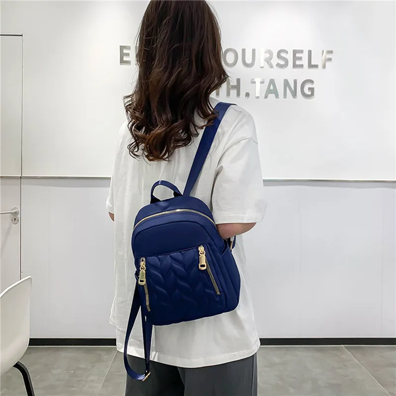 

New Fashion Women Backpack Urban Simple Casual Backpack Trend Travel Solid Color Nylon Bag Waterproof Lightweight Ladies Bag