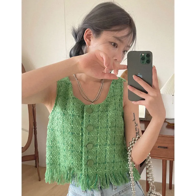 

Clothland Women Chic Tweed Sleeveless Blouse O Neck Single Breasted Tassels Crop Top Short Style Retro Tops Mujer WA136