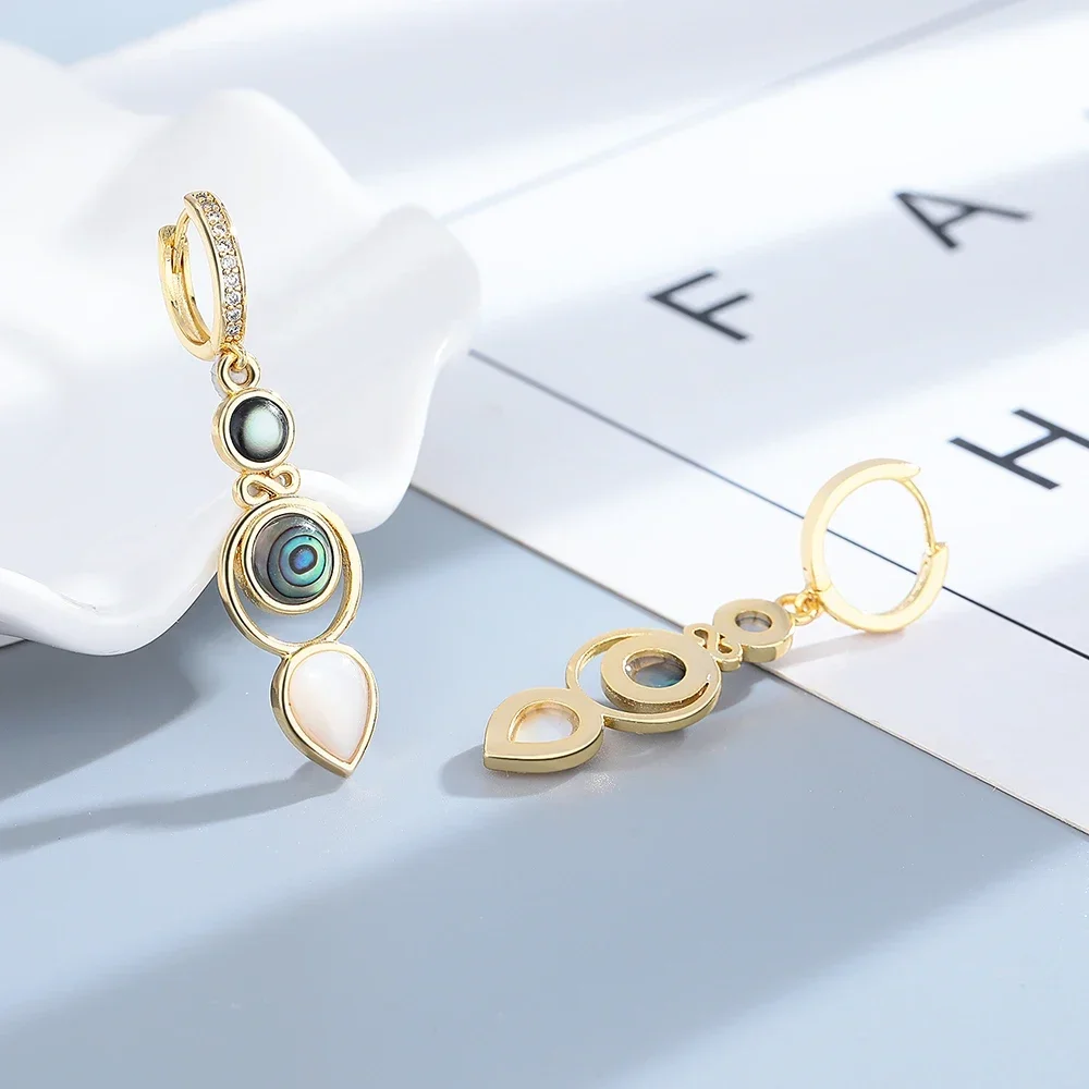 Женские серьги-кольца в виде ракушек