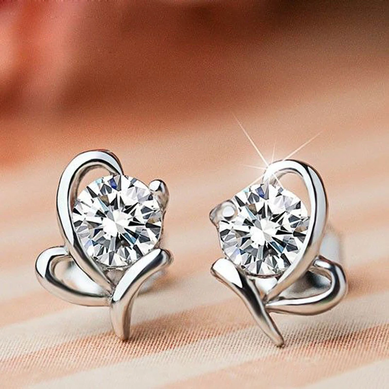 

Huitan Chic Small Stud Earrings for Women Solitaire Crystal Round Cubic Zirconia Simple Stylish Accessories Statement Jewelry