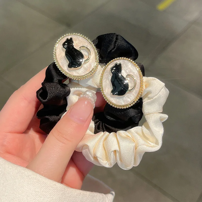 

Korean Version Cute Cat With Large Intestine Hair Ring Temperament, Little Bear Head Rope, Female Simple And High-End Leather Ba