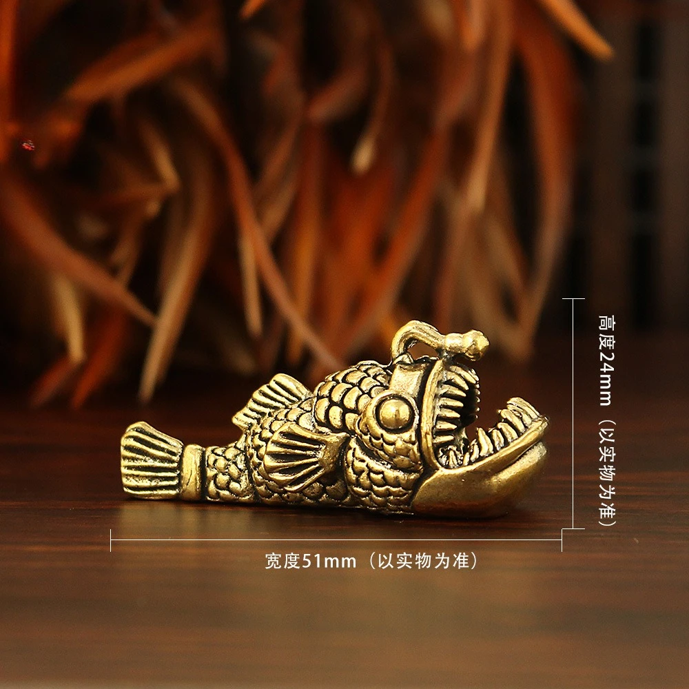 

Медная фигурка морской рыбы