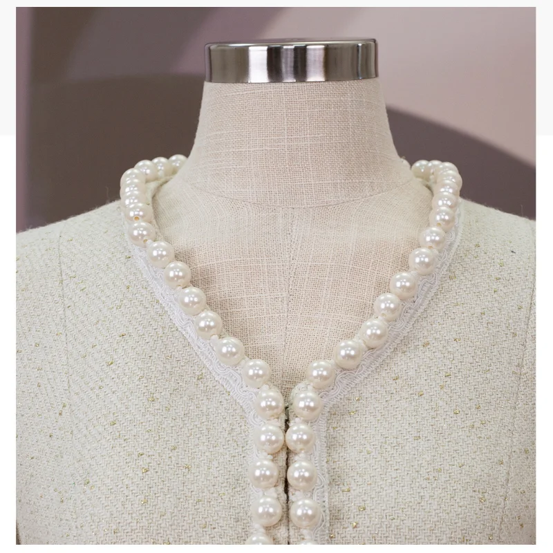 Рисунок 5 - Женское твидовое короткое пальто