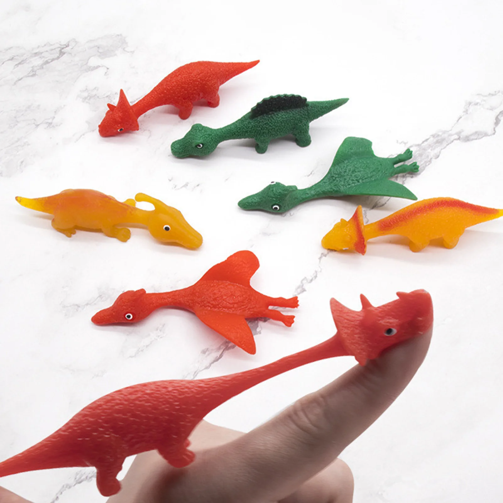 

Funny Cute 5pcs/set Catapultou Slingshot Toy Rubber Dinosaur Chicken Small Shape People Flying Toy Finger Game Toys Elastic