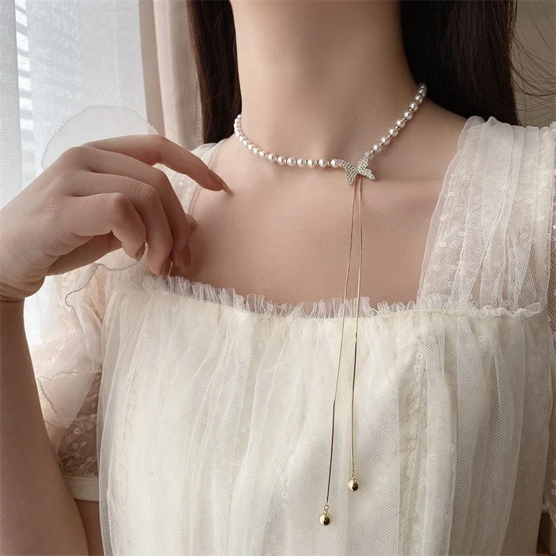 

2022 New Designer Fashion Jewelry Pearl Long Butterfly Stretch Adjustable Necklace Elegant Women Long Tassel Party Necklace