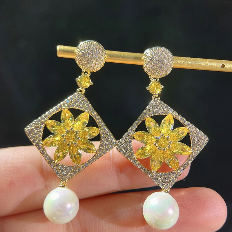 

Женские серьги-подвески из серебра 925 пробы с пресноводным жемчугом и цирконием