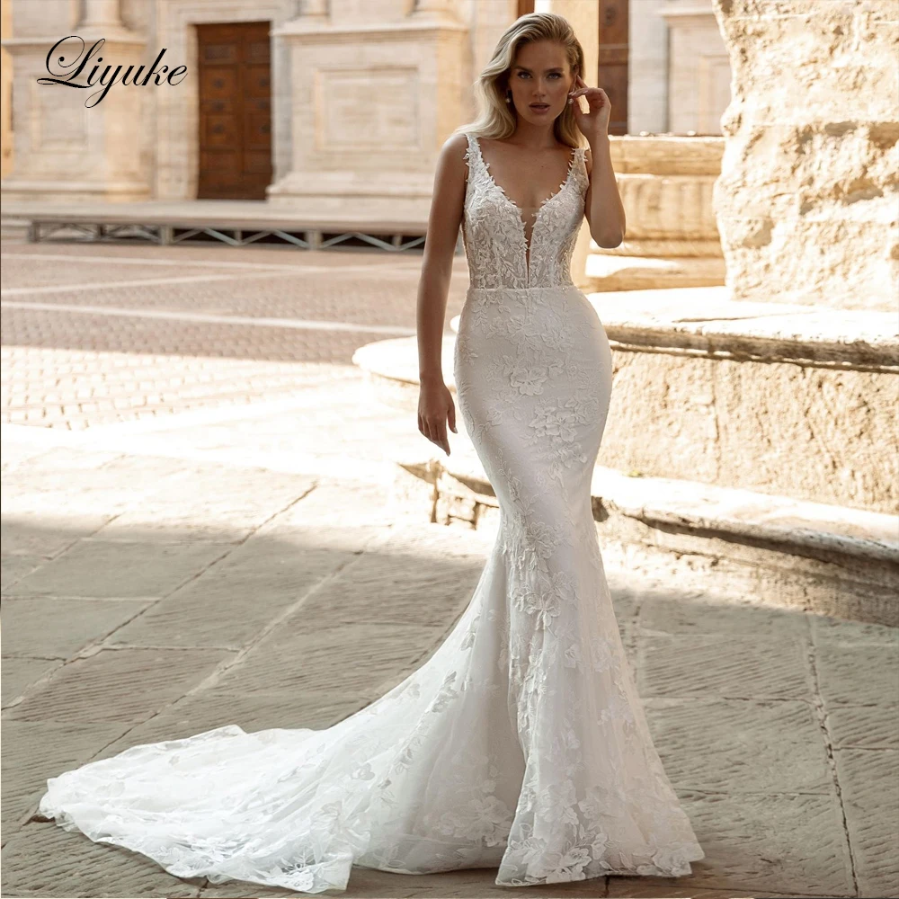 

Liyuke Elegant V-Neck Mermaid Wedding Dress Empire Embroidery Lace Backless Spaghetti Straps Bridal Gowns