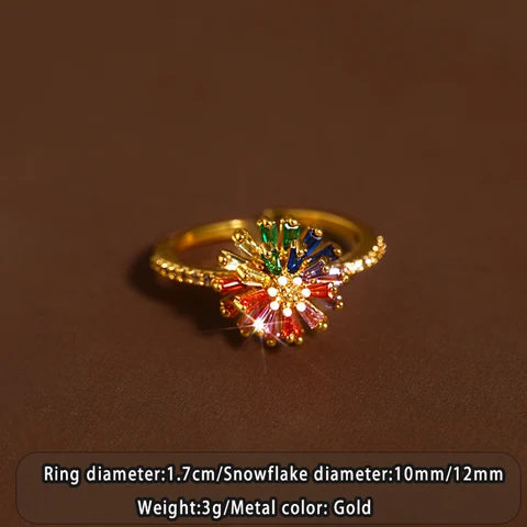 Кольца Таоя золотые с цирконами