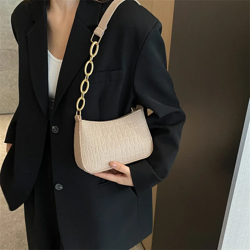 One Shoulder Bag 2023 New Women's Subaxillary Bag Niche Design Advanced Texture Armpit Handbag Crescent Saddle Bag Dermatoglyph