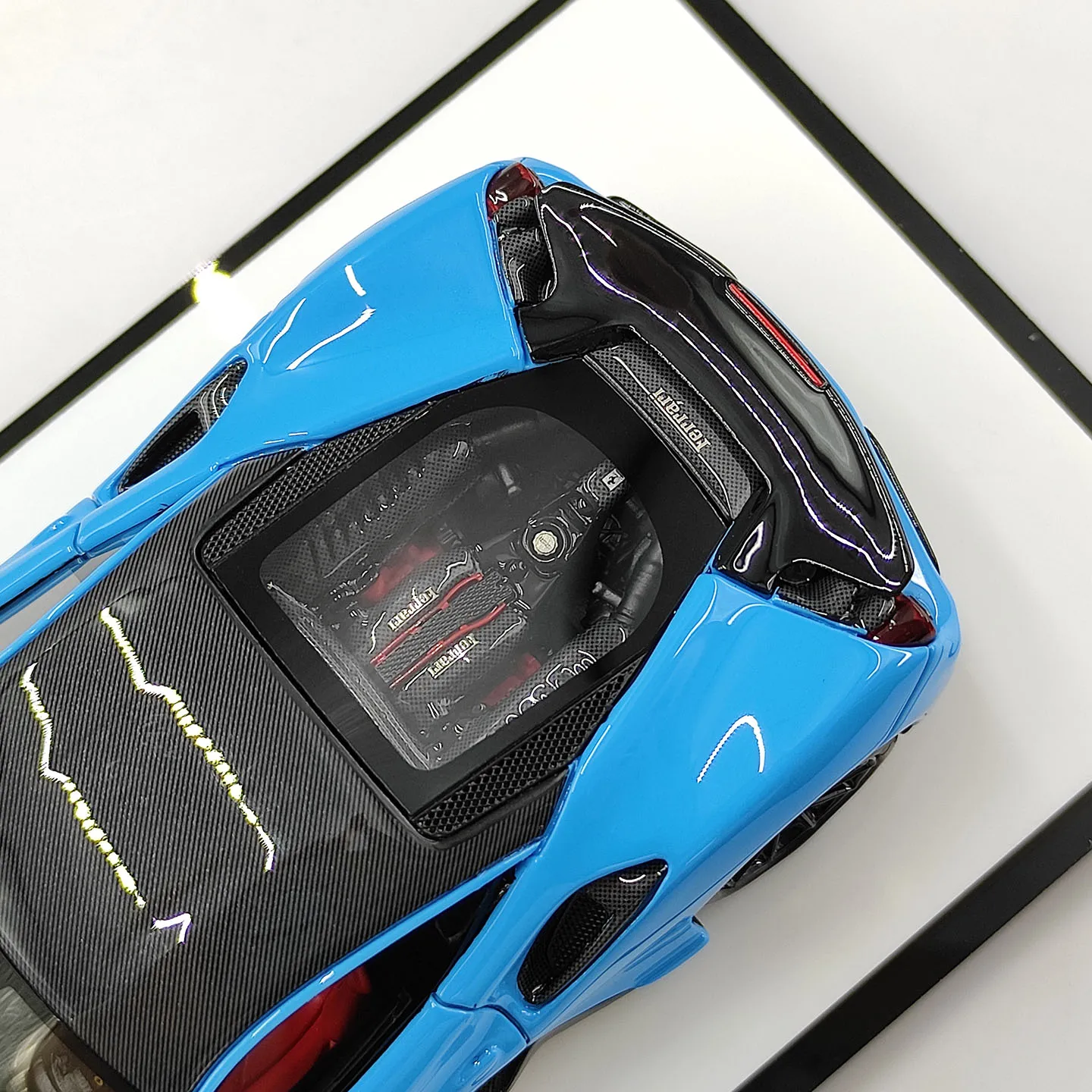 Фото Модель автомобиля JCM 1:43, синий суперкар Ferrari 488 из смолы, классические игрушечные машины, ностальгия, подарки для взрослых, сувенир, статичная модель для демонстрации. №4