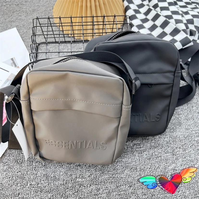 

2023 Embossed Logo Essentials Backpacks Men Women Synthetic Leather Essentials Bags Multifunctional Zip Vertical Bag
