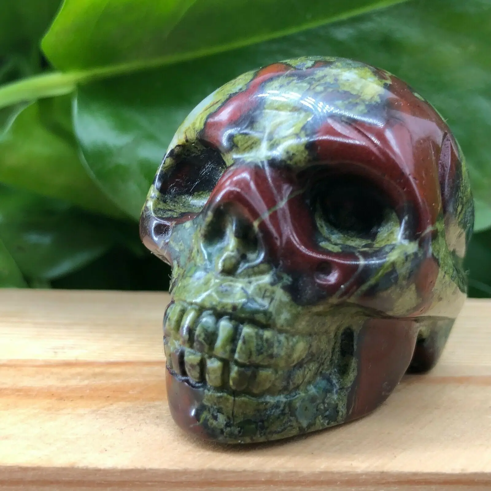 

1pcs Natural blood quartz hand carved skull crystal reiki
