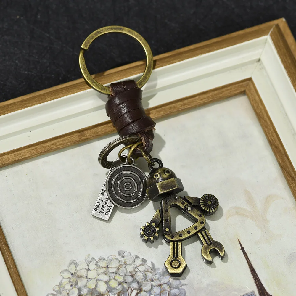Vintage woven cowhide keychain, simple and personalized, cute robot pendant, car key pendant