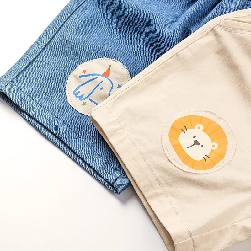 Детские хлопковые шорты для мальчиков и девочек однотонные с мультяшным принтом