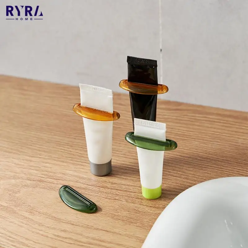 

Креативное ручное устройство для зубной пасты, выдавливатель для тюбиков, многофункциональное пластиковое средство для очистки лица, прес...