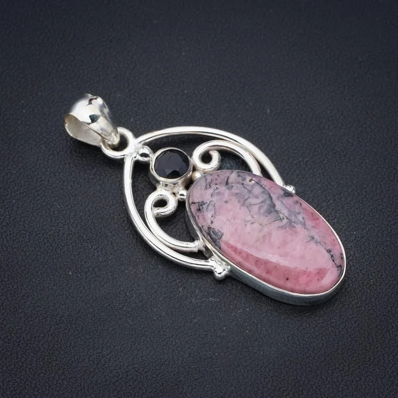 

Подвеска из родонита черного цвета ручной работы, серебряная, 1,75 дюйма, F3586