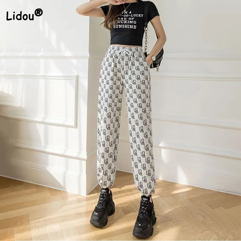 

Autumn Korean Letter Printing Ice Shredded Harun Pants Athleisure Fashion Bandage Pockets Corset Nine Points Sweatpants Trend