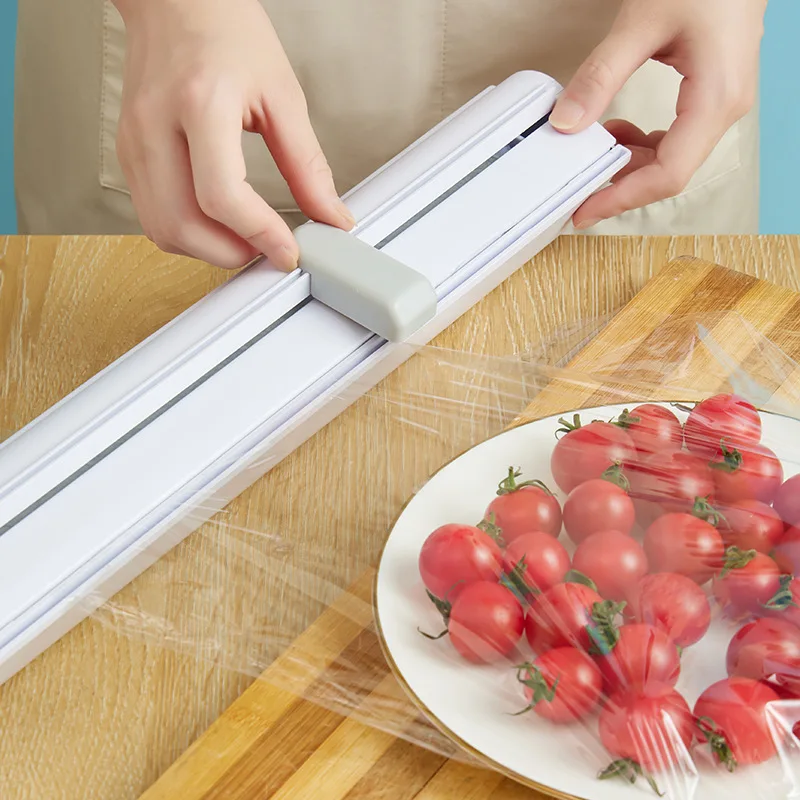 

Food Wrap Dispenser Magnetic Wall Mounted Foil and Cling Film Dispenser Sliding Knife Type Packing Machine Kitchen Accessories