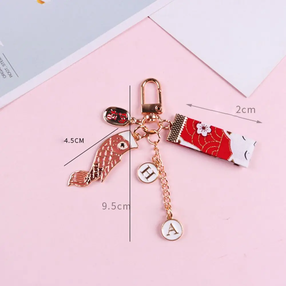 Cute Anime Carp Streamer Keychain Ladies Metal Lucky Mobile Phone Pendant Car Bag Pendant Bluetooth Earphone Box Pendant