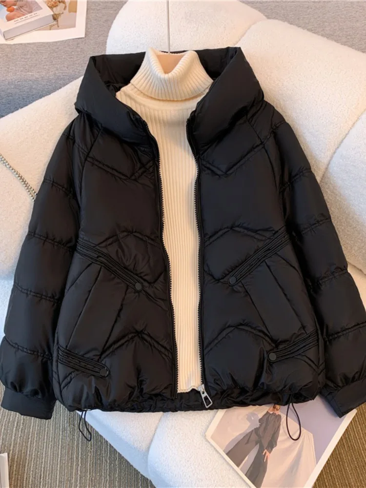 Зимняя популярная теплая женская одежда больших размеров. Пуховик с капюшоном.