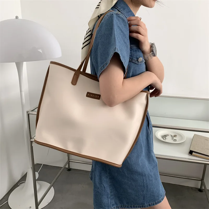 

Woman Shoulder Fashion New Female Tote Bag 2022 Pu Leather Zipper Luxury Handbags Large Women Bags Designer Purse Simple Bolsas