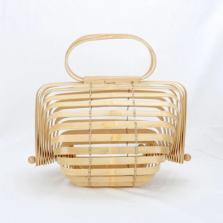 

2022 New Japanese Style Bamboo Straw Handcraft Lantern Rattan Handbag Gift Foldable Fashion Catwalk String Woven Designer Bag