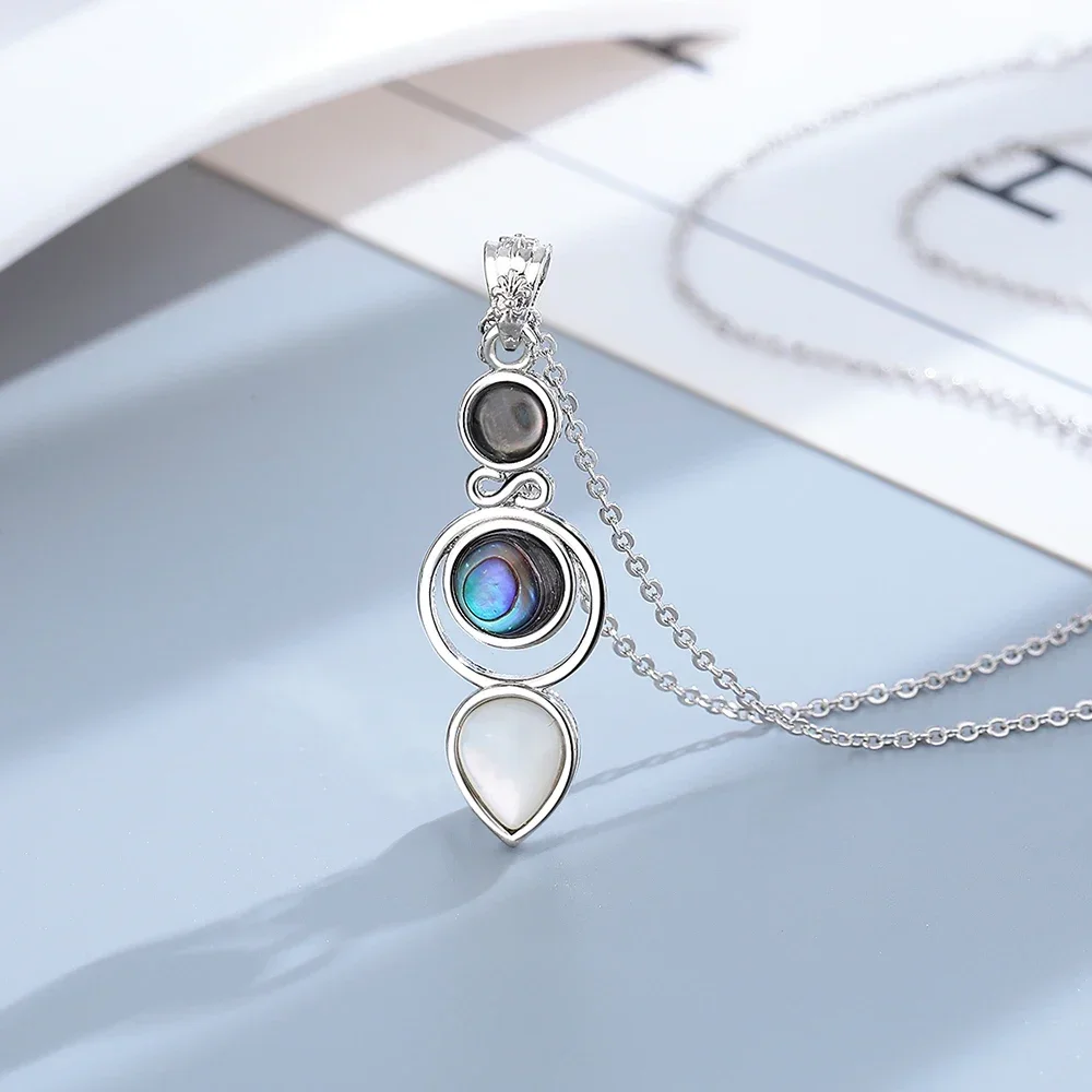 Женские серьги-кольца в виде ракушек