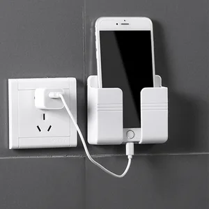 wall mounted organizer storage box remote control mounted mobile phone plug wall holder charging multifunction holder stand free global shipping