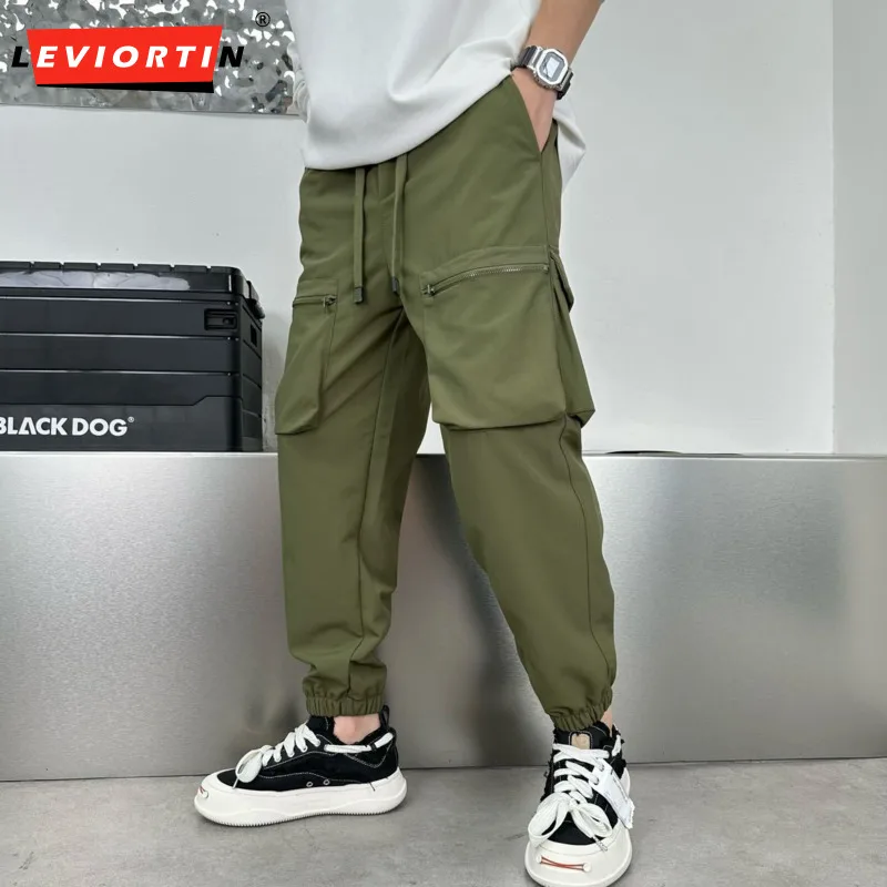 

2023 Men Cargo Pants Solid Multiple Pockets Drawstring Elastic Feet Straight Trousers Streetwear Autumn Casual Baggy Pants