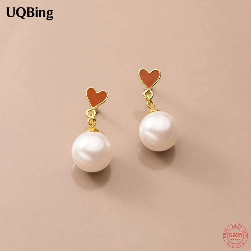 

Серьги-гвоздики из серебра 925 пробы с эмалью и искусственным жемчугом