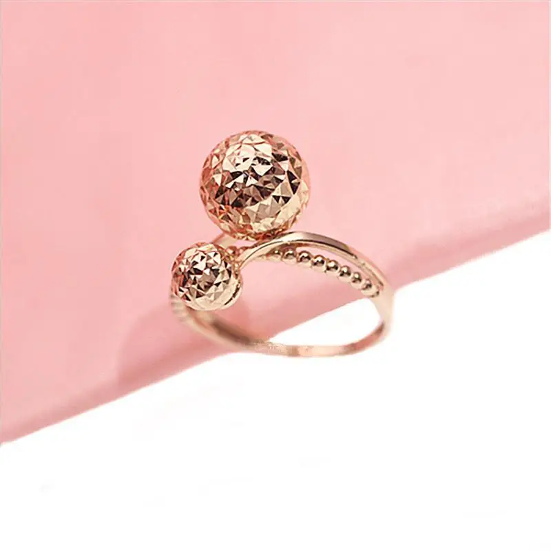 

Женское блестящее кольцо из розового золота 585 пробы с двумя шариками