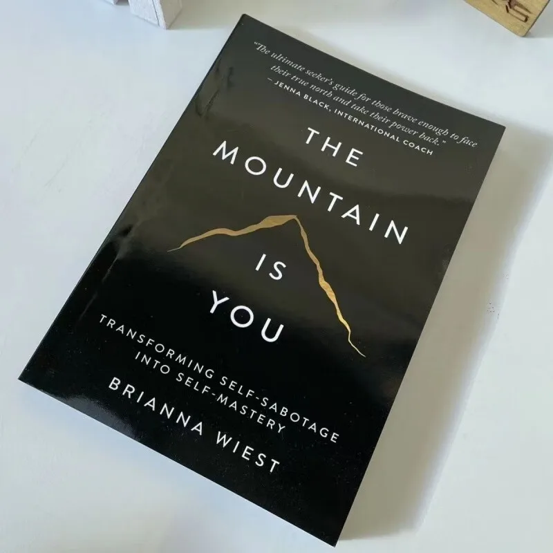 Книга &quotThe Mountain Is You" Brianna Wiest
