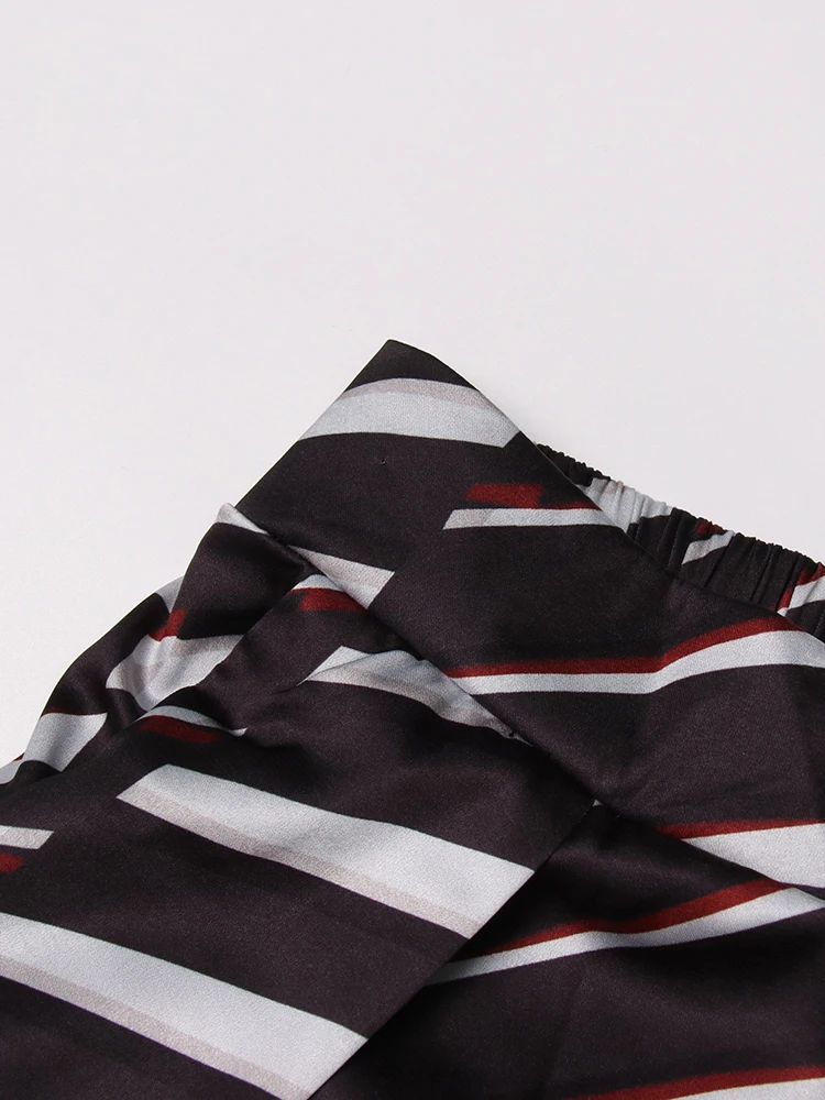 Женские брюки в полоску с высокой талией и карманами