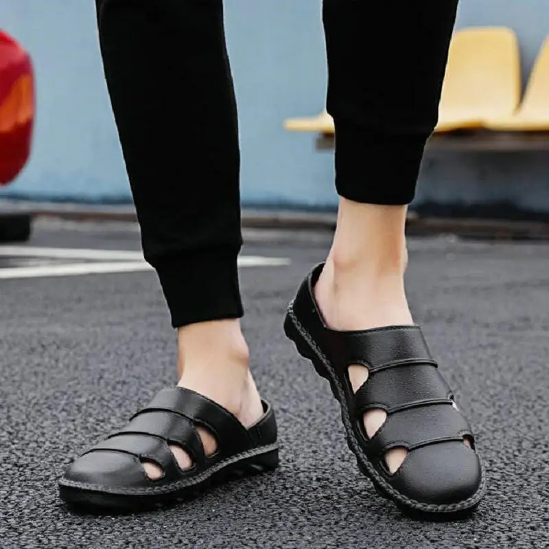 Driving shoes men's summer Baotou soft bottom sandals and slippers Year's new deodorant leather sandals men's casual beach shoes