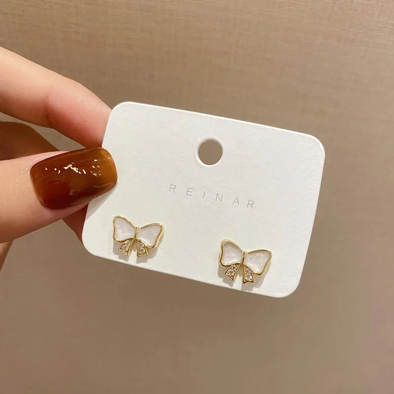 

Korean Style Shining Crystal Bow-knot Earrings for Women Small Golden Simple Design Women's Stud Earring Ear Jewelry Accessories