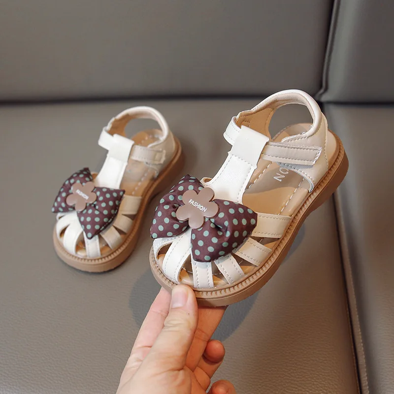 

Girls Sweet Princess Shoes Kids Hollow Peep-toe Polka Dot Printing Shoes with Bowtie Soft Summer Fashion Kids Toes Capped Shoes