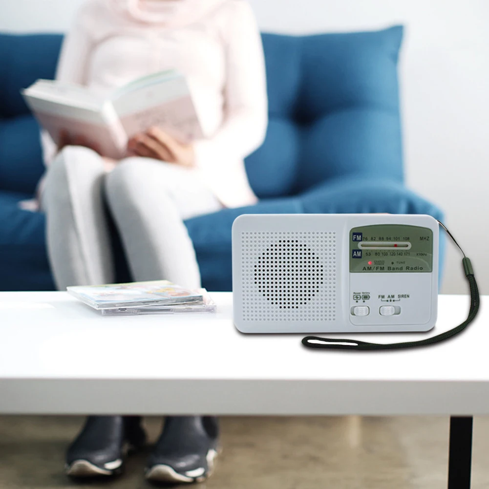 emergency radio with solar and hand crank self powered battery usb recharging fmam radio led flashlight phone charger free global shipping