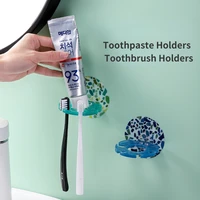 self adhesive wall mount toothbrush holder toothpaste dispenser storage squeezer shaver holder storage rack bathroom shelves