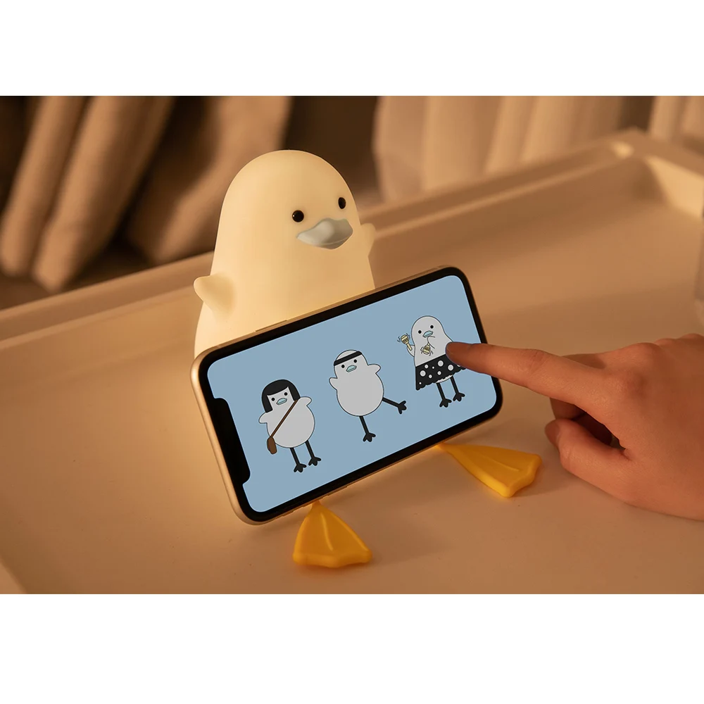 

2022 Hot Sale Cute Duck Night Light Tap Silicone Night Light Timing Off Phone Holder Light For Children Gift