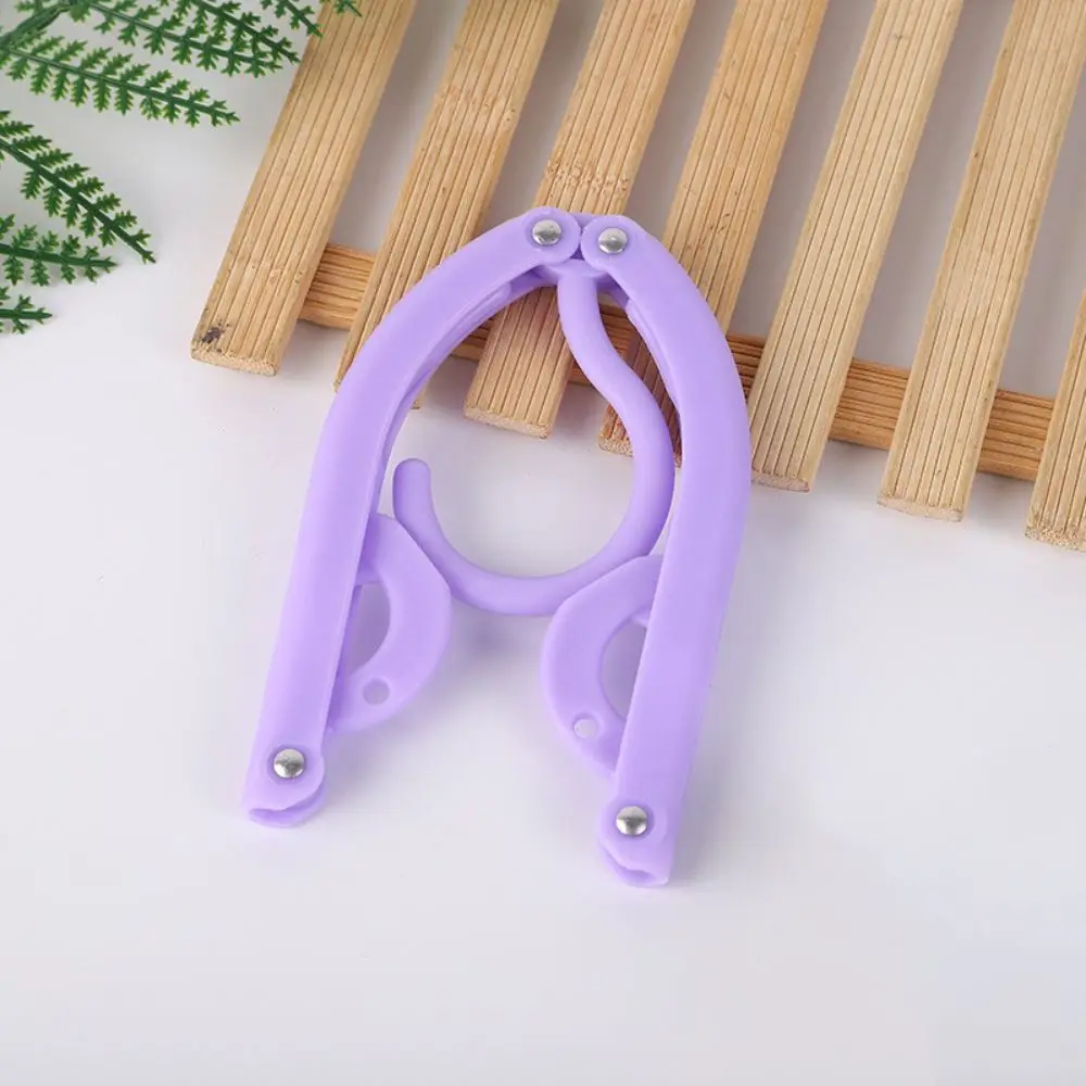 

Пластиковые складные вешалки 12 шт.