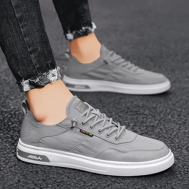

Men Casual Shoes The New Breathable Running Sneakers Male Solid Color Fashion Hard-Wearing Mens Shoes Flat Man Sneakers Zapatos
