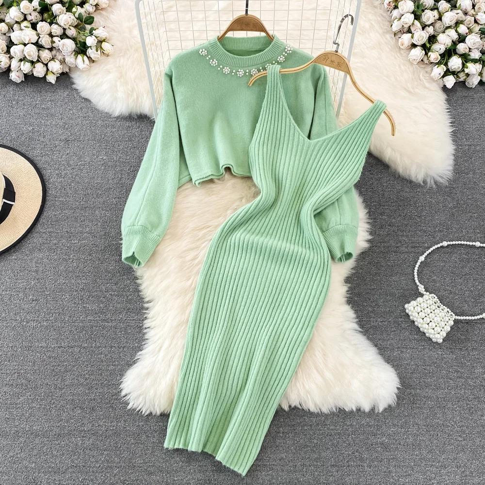 

2023 Autumn And Winter New Knitted Suit Dress Hot Sell Round Neck Nail Bead Slimming Temperament In The Long Suit Dress 339