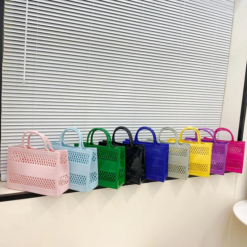 

2023 Summer New Shopping Basket PVC Jelly Bags Large Capacity Storage Candy Color Hollow Beach Designer Tote Handbag For Ladies