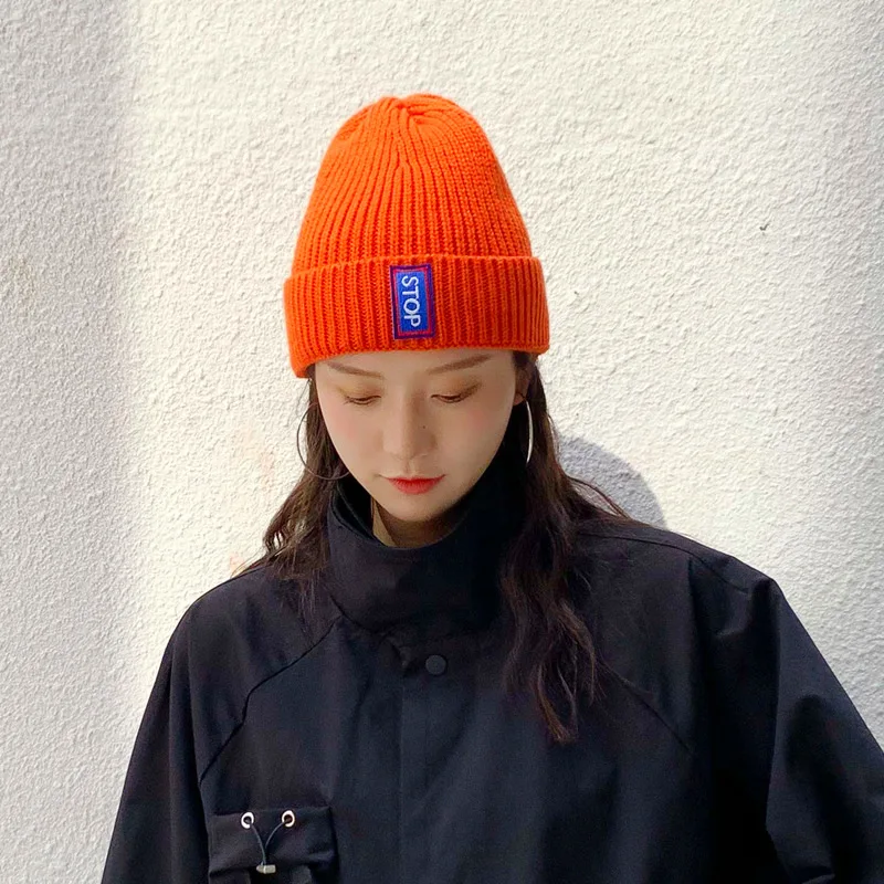 

Woolen hat autumn and winter women's new English letters block student warm knitted hat men's fashion couple hat