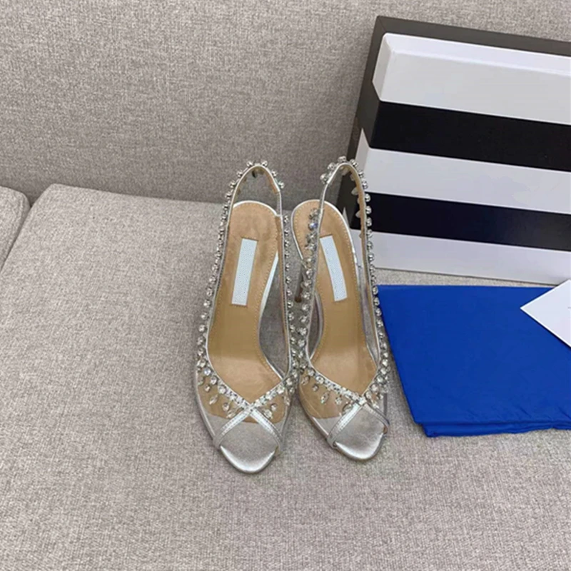 Spring and summer new European and American women's fish mouth high heels transparent rhinestone fashion banquet shoes