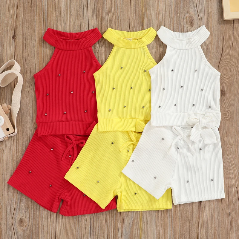 

От 1 до 6 лет Одежда для маленьких девочек; Ребристые Топы на бретельках с лямкой на шее и регулируемой повязкой на подоле; Эластичные шорты н...